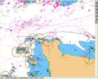 Electronic Chart Display and Information System (ECDIS) interface showing detailed maritime navigation charts with various symbols indicating navigation aids, hazards, and courses.