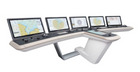 A modern ECDIS training workstation featuring multiple monitors displaying electronic navigation charts and navigational data, designed for enhancing maritime training and safety.